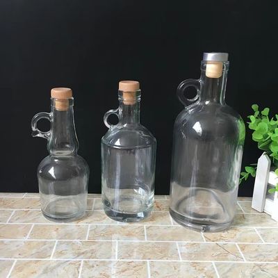 Sturdy Base 750ml Glass Vodka Whiskey Bottle with Handle and Customization Service