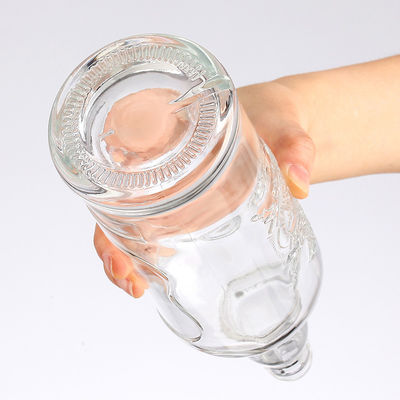 550ml/700ml/750ml Wine Red Wine Spirits Glass Bottle with Screw Cap Big Belly Design